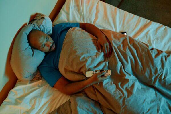 Person unable to sleep after turning off the TV