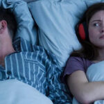 Person unable to sleep in a quiet bedroom using background noise