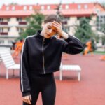 Person feeling dizzy after jumping jacks during cardio workout