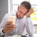Person feeling lightheaded after drinking coffee in the morning