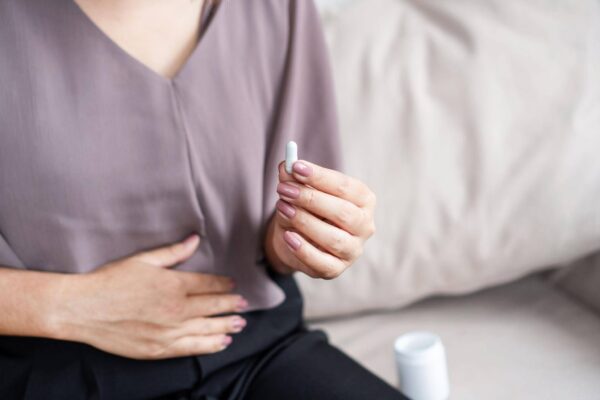 Vitamin pills and stomach discomfort after taking supplements