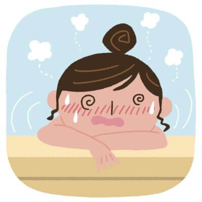 Person feeling weak and unsteady after a hot shower