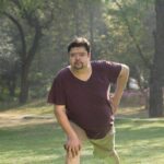 Person struggling during deep stretching pose