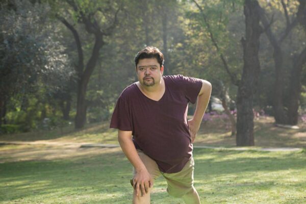 Person struggling during deep stretching pose