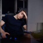 Person feeling nauseous while playing a fast first-person video game