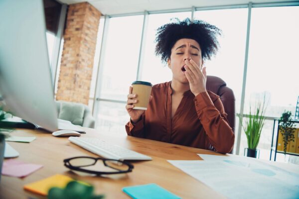 Person feeling tired after drinking coffee instead of energized