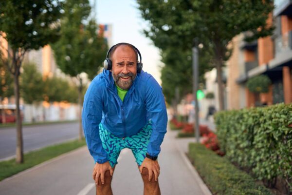Person feeling unusually tired after a short walk outdoors