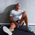 Person feeling tired and relaxed after a stretching routine