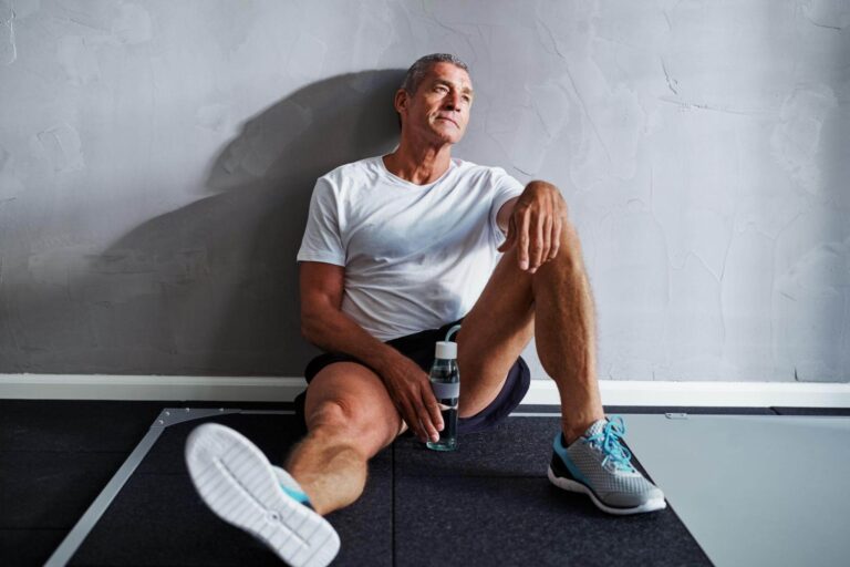 Person feeling tired and relaxed after a stretching routine