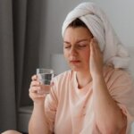 Person feeling faint after standing up from a hot bath