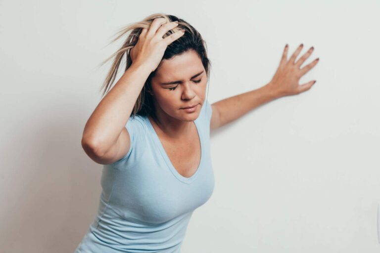 Weakness and dizziness after a hot shower related to blood pressure changes