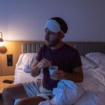 Person lying awake in bed after drinking tea at night