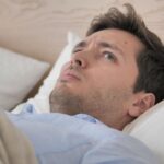 Person waking up from a nap feeling anxious and disoriented