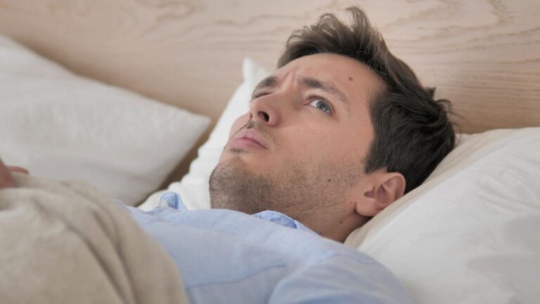 Person waking up from a nap feeling anxious and disoriented