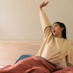 Person feeling lightheaded after yawning and stretching