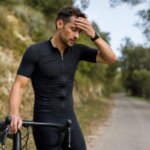 Cyclist feeling dizzy after getting off a bike following a ride