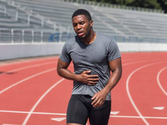 Runner feeling discomfort after intense sprinting